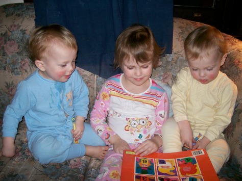 charlie reading to twins