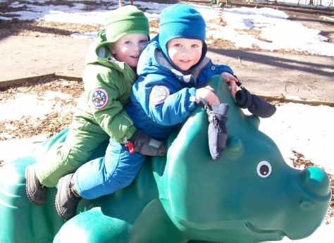 eli and will riding dinosaur